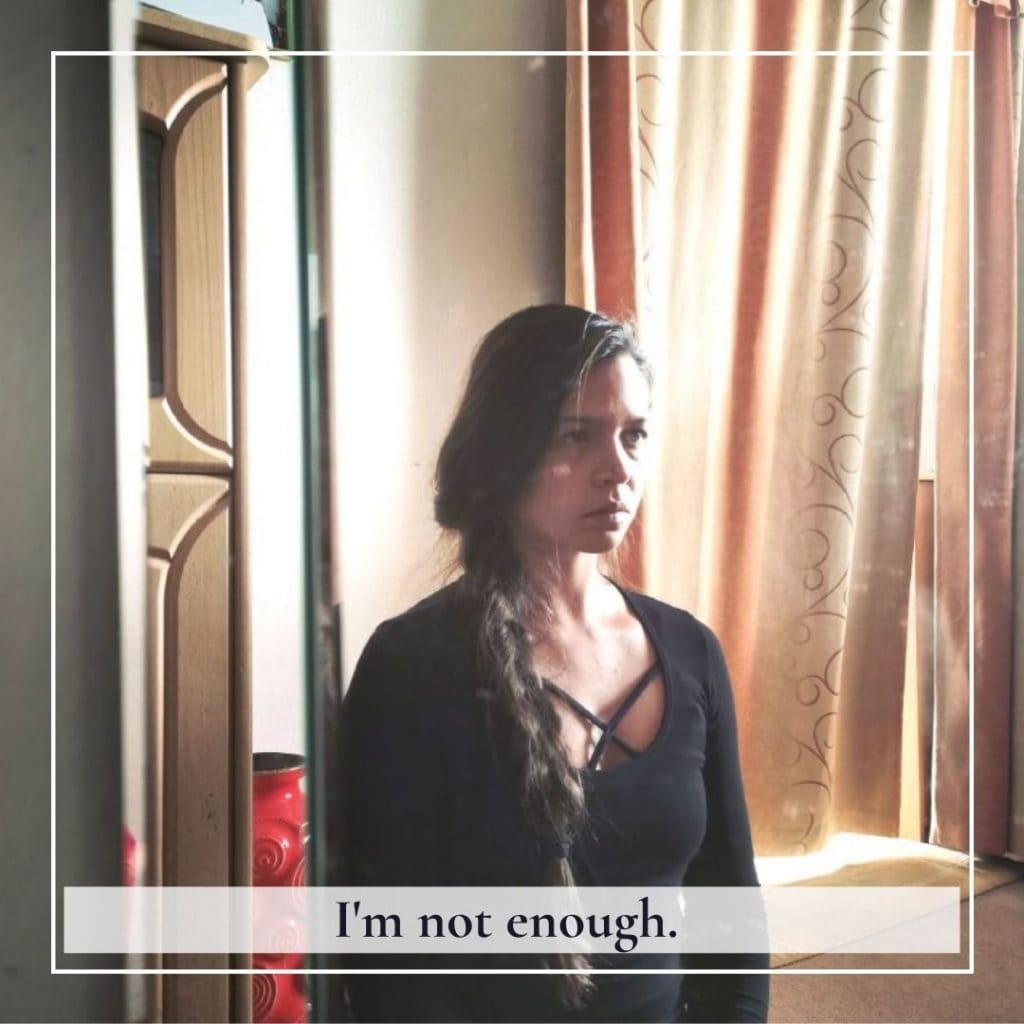 I am not enough. Picture infront of the mirror.