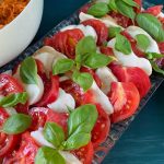 Vegan caprese salad with tomates and basil