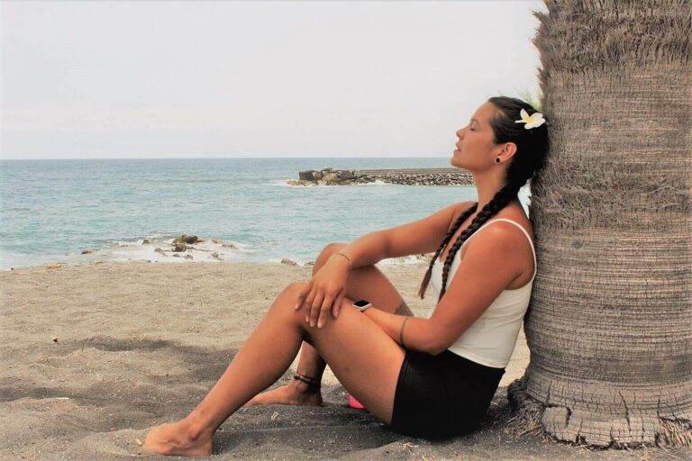 Stefanie Grace resting on the beach