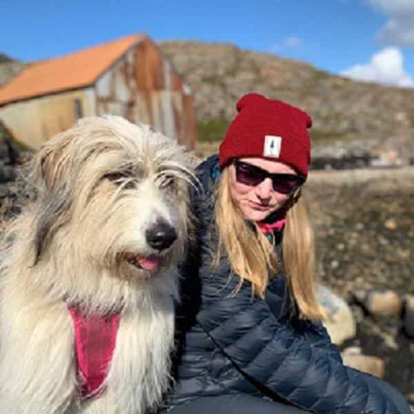 Private Client of Stefanie Grace, with her dog, outside.
