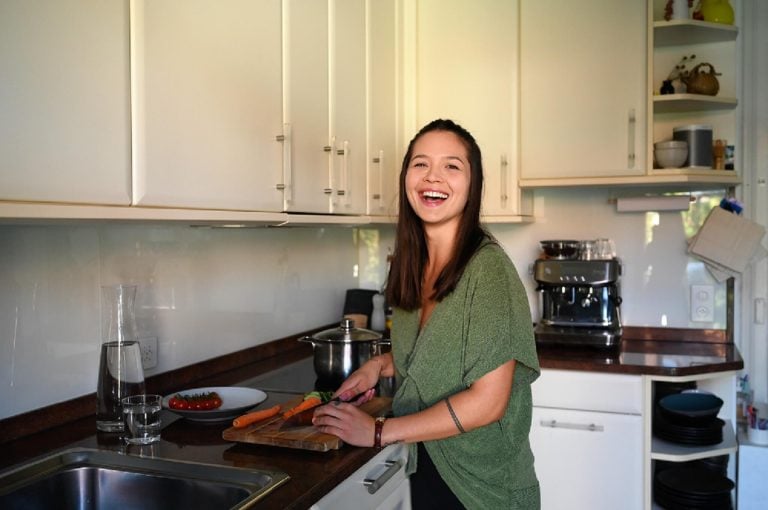 Stefanie Grace happy in the kitchen preparing food